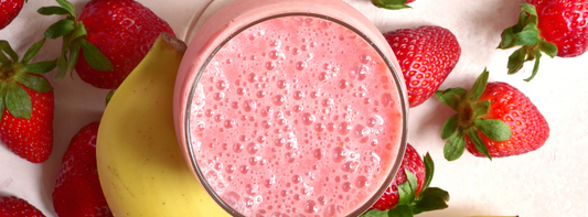A banana smoothie with strawberries